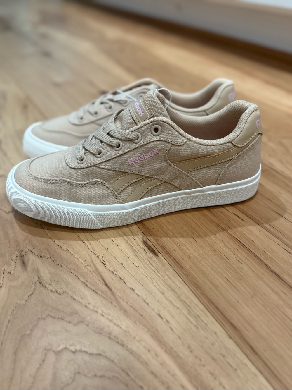 Reebok Beige Low-Top Sneakers with Pink Logo